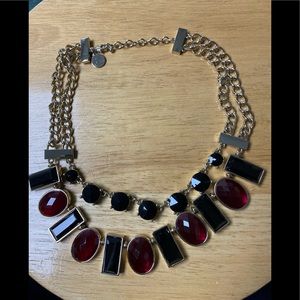 Black and red necklace with gold chain